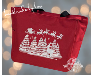 Red with winter scene of six snow-covered Christmas trees, with red ornaments. Above trees is Santa and his sleigh, pulled by 8 reindeer